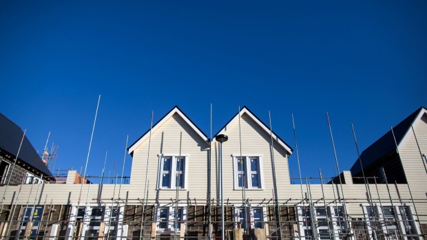 Scaffolding surrounds new homes under construction at a Countryside Properties Plc new housing development in Chelmsford, U.K., on Friday, Jan. 22, 2021. House prices boomed during 2020, reaching a record high in December as a tax cut spurred Brits to upgrade their living situations after months of working from home. Photographer: Chris Ratcliffe/Bloomberg