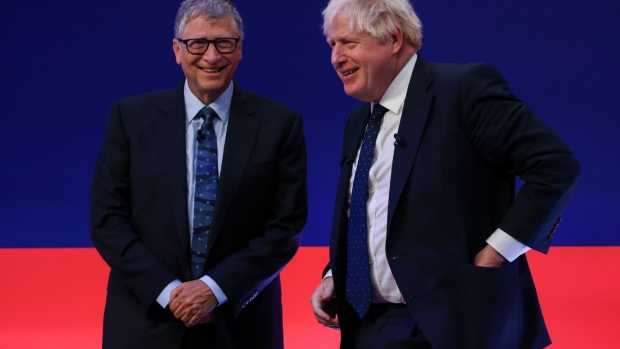 Bill Gates, left, and Boris Johnson during the Global Investment Summit in London, on Oct. 19.