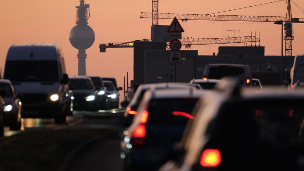 BERLIN, GERMANY - JANUARY 21: Cars and trucks drive in the eastern part of the city as the broadcast tower at Alexanderplatz and construction cranes stand behind on January 21, 2020 in Berlin, Germany. The city is considering means towards reducing the number of fossil-fuel burning cars, though a recent proposal by a Greens party city politician to ban them by the end of the decade hit strong opposition from other parties. (Photo by Sean Gallup/Getty Images) Photographer: Sean Gallup/Getty Images Europe