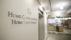 Signage is displayed outside the Home Capital Group Inc. headquarters office in Toronto, Ontario, Canada, on Thursday, May 4, 2017. The downward spiral of Home Capital Group Inc. is rippling across North America as investors and regulators try to piece together the impact it could have on the fastest growing economy in the developed world. Photographer: Cole Burston/Bloomberg