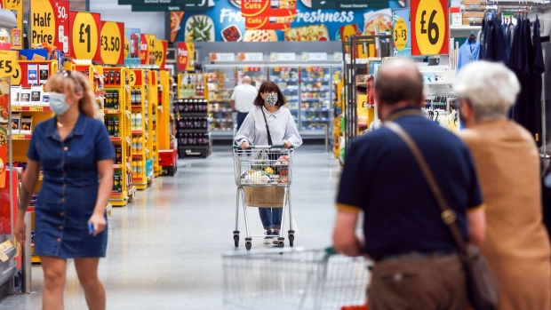 Customers move through a Morrisons supermarket, operated by Wm Morrison Supermarkets Plc, in Saint Ives, U.K., on July 5, 2021.