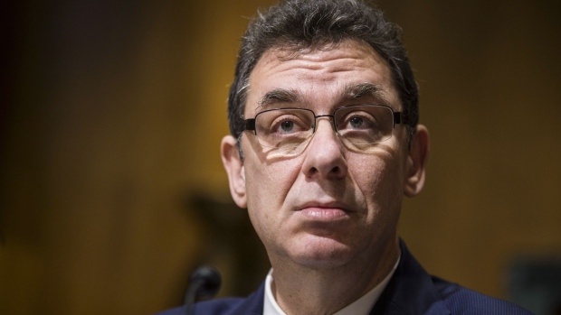 Albert Bourla, chief operating officer and chief executive officer of Pfizer Inc., listens during a Senate Finance Committee hearing on drug pricing on Capitol Hill in Washington, D.C., U.S., on Tuesday, Feb. 26, 2019. Top executives from seven of the world's biggest drug companies are testifying before Congress to talk about drug costs, a long-awaited session that could kickstart legislation to rein in prices.