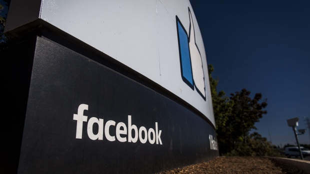 Signage is displayed outside Facebook Inc. headquarters in Menlo Park, California, U.S., on Tuesday, Oct. 30, 2018. Facebook Inc., which had warned of rising costs and slowing growth, reported quarterly revenue roughly in line with expectations and profit that beat analysts' forecasts. And despite scandals around fake news and election interference, it added more users, too. Photographer: David Paul Morris/Bloomberg