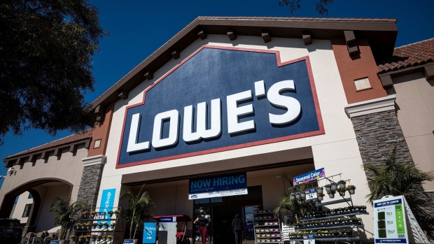 Signage outside a Lowe's store in Concord, California, U.S., on Tuesday, Feb. 23, 2021. Lowe's Cos Inc. is expected to release earnings figures on February 24. Photographer: David Paul Morris/Bloomberg
