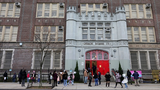 Children line up as they wait to enter P.S. 179 Kensington on December 07, 2020 in New York City.