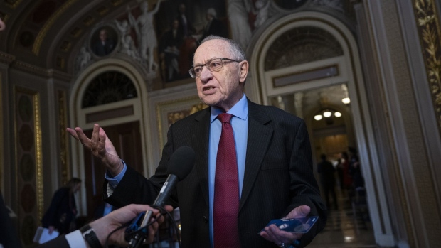 Alan Dershowitz, lawyer for President Donald Trump, speaks to members of the media at the U.S. Capitol in Washington, D.C., U.S., on Wednesday, Jan. 29, 2020. Senators will spend the next two days grilling President Donald Trump's defense team and House impeachment managers, with Senate Majority Leader Mitch McConnell trying to salvage his plans for a quick trial, which hinge on a pivotal vote on witnesses that could be held Friday.