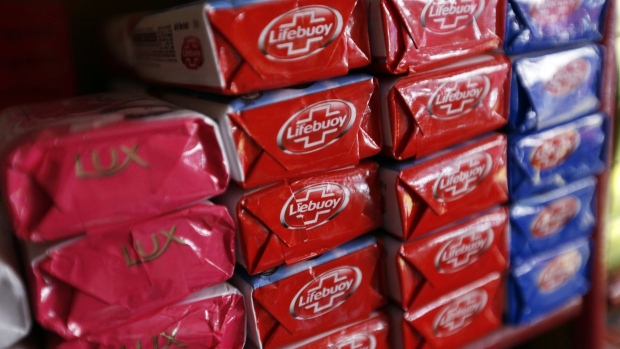 Packets of Lifebuoy soap, manufactured by Hindustan Unilever Ltd., center, are displayed for sale at a general store in Mumbai, India, on Wednesday, Feb. 12, 2014. Unilever is the world’s second-largest consumer-goods maker. Photographer: Vivek Prakash/BLOOMBERG