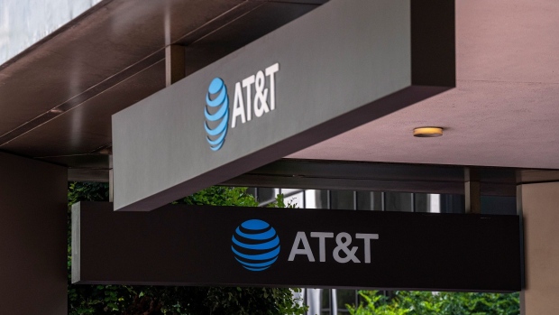 Signage at an AT&T store in San Francisco, California, U.S., on Tuesday, July 20, 2021. AT&T Inc. is scheduled to release earnings figures on July 22. Photographer: David Paul Morris/Bloomberg