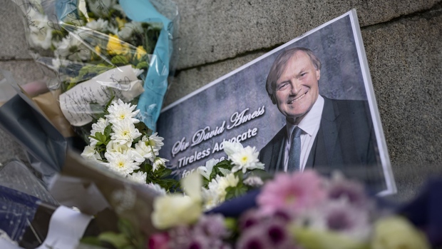 Floral tributes to Sir David Amess MP outside Parliament on October 19, 2021 in London.