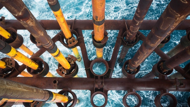 Pipes used to extract gas condensate from the Armada gas field extend from the seabed to the Armada gas condensate platform, operated by BG Group Plc, in the North Sea, off the coast of Aberdeen, U.K., on Thursday, Dec. 10, 2015. Royal Dutch Shell Plc got clearance from antitrust authorities in China for the takeover of BG Group Plc, removing the final regulatory hurdle for its biggest-ever deal. Photographer: Bloomberg/Bloomberg