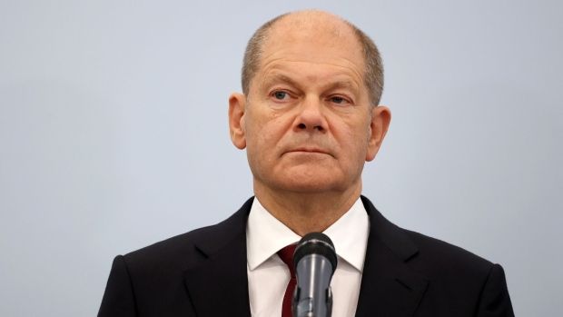 Olaf Scholz, Germany's finance minister and chancellor candidate for the Social Democratic Party (SPD), attends a statement to the media after exploratory coalition talks in Berlin, Germany, on Friday, Oct. 15, 2021. Scholz reached a milestone in his bid to succeed Angela Merkel as German chancellor by getting his potential partners close enough to enter formal negotiations for a coalition government.