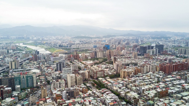 Residential buildings stand in this aerial photograph taken in Taipei, Taiwan, on Saturday, March 30, 2019. According to Knight Frank's 2019 Wealth Report, Taipei was eighth in a global list of cities ranked by the number of ultra-high-net-worth individuals, with 1,519 people who have at least $30 million in assets. And the property firm predicts that number will rise to 1,864 by 2023.