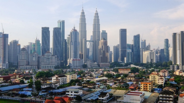 The skyline in Kuala Lumpur, Malaysia, on Tuesday, May 12, 2021. Malaysia will follow a standardized protocol nationwide to make it easier for people to comply with social-distancing procedures as the nation bolsters efforts to stem a new wave of Covid infections.