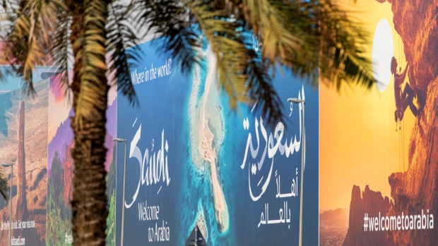 A billboard advertisement for the Saudi Arabian tourist board stands on display along the Sheikh Zayed Road in Dubai, United Arab Emirates, on Friday, Oct. 18, 2019. Already pursuing a piecemeal transformation to prepare for the post-oil era, Saudi Arabia has embarked on a makeover no less momentous with its recent drive to attract holidaymakers for the first time, showing it’s even willing to bend rules on how foreign women dress.
