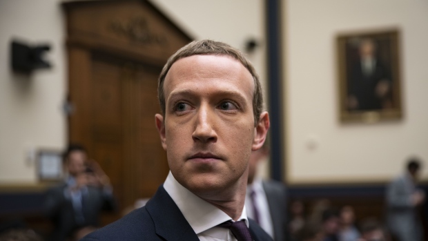 Mark Zuckerberg, chief executive officer and founder of Facebook Inc., arrives for a House Financial Services Committee hearing in Washington, D.C., U.S., on Wednesday, Oct. 23, 2019. Zuckerberg struggled to convince Congress of the merits of the company's plans for a cryptocurrency in light of all the other challenges the company has failed to solve.