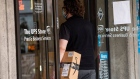 A customer enters a UPS store in San Francisco, California, U.S., on Monday, July 26, 2021. United Parcel Service Inc. is expected to release earnings figures on July 27.
