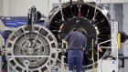 An employee assembles a LEAP jet engine at the General Electric Co. (GE) Aviation assembly plant in Lafayette, Indiana, U.S., on Friday, July 19, 2019. General Electric is scheduled to release earnings figures on July 31.