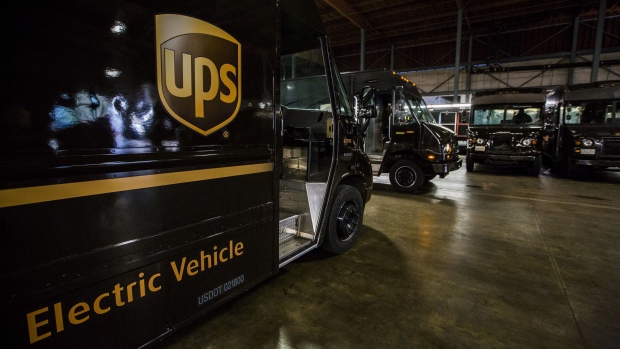 United Parcel Service (UPS) delivery trucks prepare to depart from the distribution center in Sacramento, California, U.S. Photographer:  Ken James/Bloomberg