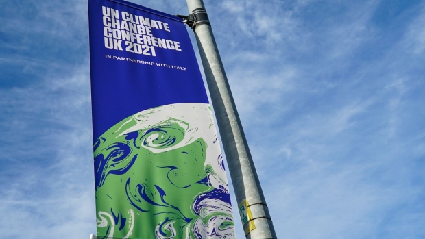 A banner advertisings the upcoming COP26 climate talks in Glasgow, U.K., on Wednesday, Oct. 20, 2021. Glasgow will welcome world leaders and thousands of attendees for the crucial United Nations summit on climate change in November. Photographer: Bloomberg/Bloomberg