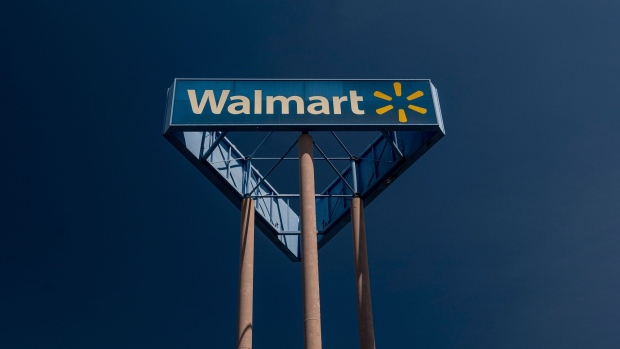 Signage outside a Walmart store in San Leandro, California, U.S., on Thursday, May 13, 2021. Walmart Inc. is expected to release earnings figures on May 18. Photographer: David Paul Morris/Bloomberg