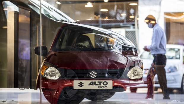 Maruti Suzuki India Ltd. Alto vehicle at one of the automaker's showrooms in New Delhi, India, on Sunday, April 4, 2021. The economic downturn from the coranavirus has been particularly visible in India's automobile sector, which is the world's fourth-largest and accounts for half of the country's entire manufacturing output, as it saw a fall in vehicle sales of more than 18% in the 12 months through February.