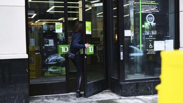 A customer enters a TD Ameritrade Holding Corp. bank branch in New York, New York, US., on Saturday, April 20, 2019. TD Ameritrade Holding Corp. is scheduled to release earnings figures on April 23. Photographer: Gabby Jones/Bloomberg