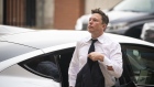 Elon Musk, chief executive officer of Tesla Inc., arrives at court during the SolarCity trial in Wilmington, Delaware, U.S., on Tuesday, July 13, 2021. Musk was cool but combative as he testified in a Delaware courtroom that Tesla's more than $2 billion acquisition of SolarCity in 2016 wasn't a bailout of the struggling solar provider.