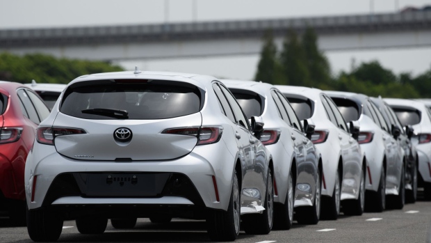 Toyota Motor Corp. Corolla vehicles bound for shipment at the Nagoya Port, in Tokai, Aichi Prefecture, Japan, on Monday, Aug. 23, 2021. The worsening chip shortage forced the world’s No. 1 automaker suspend output for several days at almost all its plants in Japan next month, forcing a 40% cut in production plans. Photographer: Akio Kon/Bloomberg