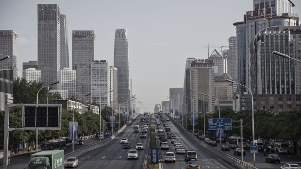 Vehicles travel along a section of the 3rd Ring Road in Beijing, China, on Monday, May 15, 2017. China's economy is staging a comeback as quickening inflation boosts factory profits, while stricter capital controls and a stabilizing currency help stem outflows. Photographer: Qilai Shen/Bloomberg