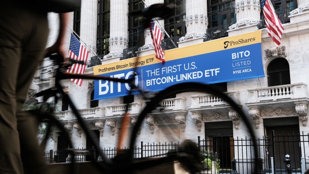 A ProShares Bitcoin Strategy ETF banner hangs outside the New York Stock Exchange on Oct. 19. Photographer: Spencer Platt/Getty Images
