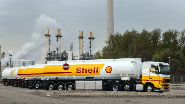 The Royal Dutch Shell Plc logo on fuel tanker trucks at the Shell Pernis refinery in Rotterdam, Netherlands, on Tuesday, April 27, 2021. Shell reports first quarter earnings on April 29. Photographer: Peter Boer/Bloomberg
