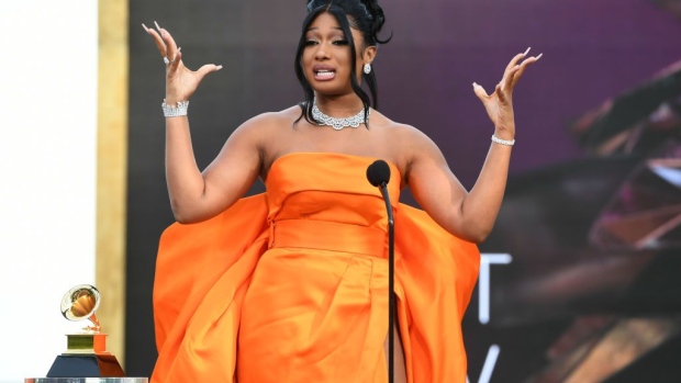 LOS ANGELES, CALIFORNIA - MARCH 14: Megan Thee Stallion accepts the Best New Artist award onstage during the 63rd Annual GRAMMY Awards at Los Angeles Convention Center on March 14, 2021 in Los Angeles, California. (Photo by Kevin Winter/Getty Images for The Recording Academy)