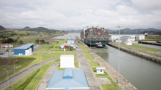 A cargo vessel travels through the Panama Canal in Panama City, Panama, on Wednesday, Dec. 4, 2019. The Panama Canal is seeing signs of a rebound in global trade as ship transits recover from the depressed levels caused by the pandemic.