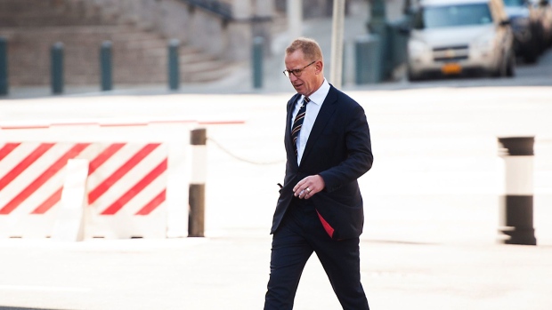 Mark Johnson, former head of global foreign exchange for HSBC Holdings Plc, arrives at federal court in the Brooklyn borough of New York, U.S., on Thursday, April 26, 2018. A U.S. District Judge will decide if Johnson, a U.K. national, will be spared separation from his family in England or sent to a U.S. prison for leading almost a dozen traders in a scheme that "ramped" up the price of the pound.