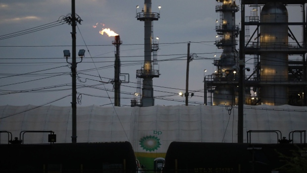 An oil flare burns at the BP Plc Whiting Refinery in Whiting, Indiana, U.S., on Sunday, Oct. 10, 2021. Oil demand is set to increase by an average of almost 4 million barrels a day in 2021 vs. a low, pandemic-driven 2020 level.