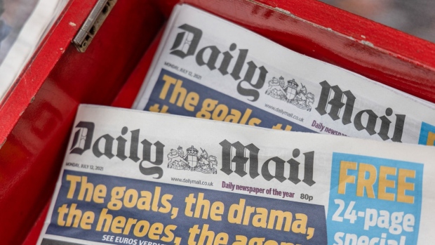 Copies of the Daily Mail newspaper on display outside a newsagent in London, U.K., on Monday, July 12, 2021. The Rothermere family is weighing a plan that could break up the owner of Britain's Daily Mail newspaper and take it private, following an approach for the companys insurance and risk division.