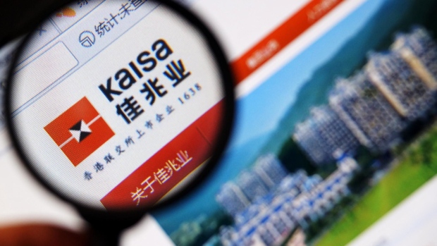 A Chinese netizen browses the website of Kaisa Group in Tianjin, China, Jan. 8, 2015. As Kaisa’s troubles unfolded, local creditors wasted no time freezing its assets, while offshore bondholders watch on.