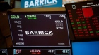 Monitors display Barrick Gold Corp. signage on the floor of the New York Stock Exchange (NYSE) in New York, U.S., on Wednesday, Jan. 2, 2019. U.S. stocks pared declines after a brutal start, with financial shares rebounding from a dismal December and crude staging a rally. Treasuries trimmed gains. Photographer: Michael Nagle/Bloomberg