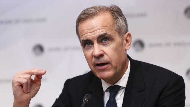 Mark Carney, governor of the Bank of England, gestures while speaking during a news conference at the central bank in the City of London, U.K., on Wednesday, March 11, 2020. The Bank of England cut interest rates in an emergency move and announced measures to help keep credit flowing through the economy, saying the coronavirus outbreak will damage economic activity.