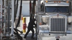 A worker pumps gasoline into a tanker truck at a Marathon Petroleum oil refinery during a driver shortage in Salt Lake City, Utah, U.S., on Thursday, July 15, 2021. Fuel-hauling companies that reduced staff during the pandemic are struggling to hire back drivers that found jobs elsewhere. Photographer: George Frey/Bloomberg