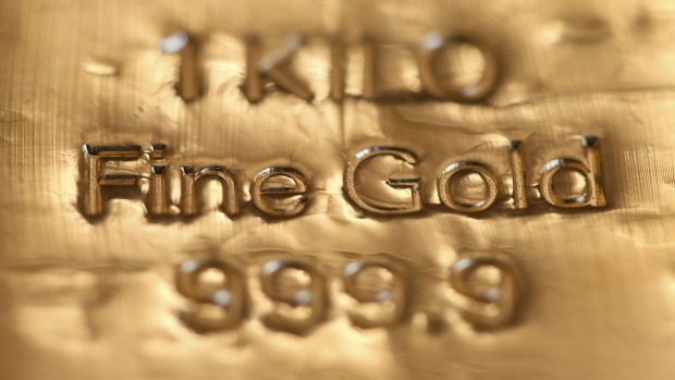 Gold in New York fell the most in more than five weeks yesterday as a stronger U.S. dollar reduced demand for the precious metal as a haven.