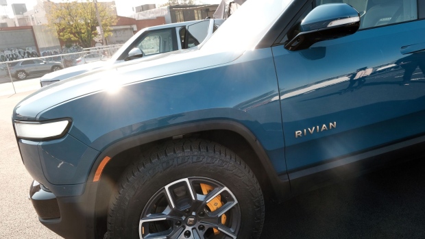 NEW YORK, NEW YORK - NOVEMBER 09: The new all-electric pickup truck by Rivian, the R1T, sits at one of its facilities on November 09, 2021 in the Brooklyn borough of New York City. The company, which makes electric trucks and is backed by Amazon and Ford, has has been valued at $64 billion ahead of its IPO tomorrow. (Photo by Spencer Platt/Getty Images) Photographer: Spencer Platt/Getty Images North America