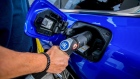 An employee refuels a H2 Mobility branded Toyota Motor Corp. Mirai hydrogen fuel cell electric vehicle at a Royal Dutch Shell Plc gas station in Berlin, Germany, on Wednesday, Aug. 25, 2021. Hydrogen remains a marginal part of Shell's energy mix, but the company expects to expand the business as part of its strategy to achieve net-zero emissions by 2050. Photographer: Krisztian Bocsi/Bloomberg