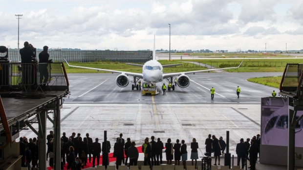 A new Airbus SE A220 narrow-body passenger jet during its unveiling by Air-France-KLM at Paris Charles de Gaulle airport in Paris, France, on Wednesday, Sept. 29, 2021. The A220s will replace 51 Airbus A318s and A319s with an average age close to 17 years that operate a significant chunk of Air France’s intra-European operations.