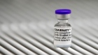 A vial of Covid-19 vaccine, produced by Pfizer Inc. and BioNTech SE, in cold storage at a vaccination center in a town hall in Paris, France, on Friday, April 9, 2021. France met its target of inoculating 10 million people with a first dose of anti-Covid vaccine on Thursday, a week ahead of schedule, as the country endures its third lockdown. Photographer: Benjamin Girette/Bloomberg