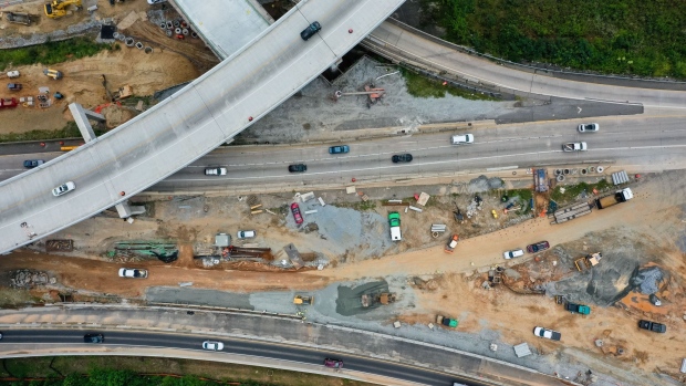 Highway construction on State Road 400 at the intersection with Interstate 75 in Sandy Springs, Georgia. Photographer: Elijah Nouvelage/Bloomberg