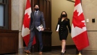 Justin Trudeau and Chrystia Freeland arrive at an Ottawa news conference on April 19 before introducing the federal budget.