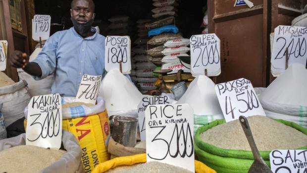 Prices in Ugandan shillings are displayed on sacks of fresh grain on a stall at Owino Market in Kampala, Uganda, on Friday, July 24, 2020. Uganda's economy will probably expand at the slowest pace in more than three decades this year due to the fallout from the coronavirus pandemic, a locust invasion and floods, the World Bank said.