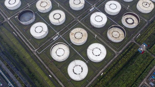 Oil storage tanks are seen in this aerial photograph taken on the outskirts of Ningbo, Zhejiang Province, China, on Wednesday, April 22, 2020. China's top leaders softened their tone on the importance of reaching specific growth targets this year during the latest Politburo meeting on April 17, saying the nation is facing "unprecedented" economic difficulty and signaling that more stimulus was in the works. Photographer: Qilai Shen/Bloomberg