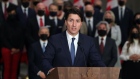 Justin Trudeau speaks at an Ottawa news conference on Oct. 26 after unveiling his new cabinet.